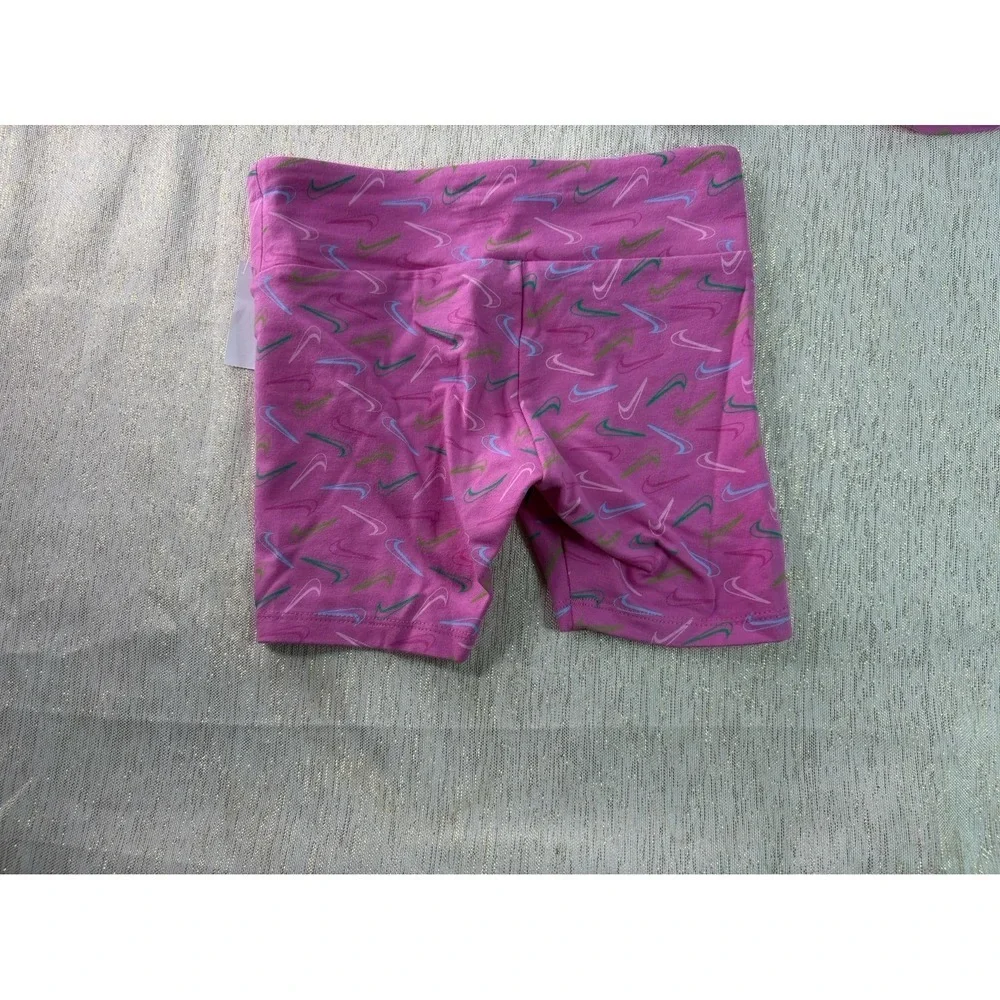 Three pairs of pink Nike biker shorts, size 6X and 6